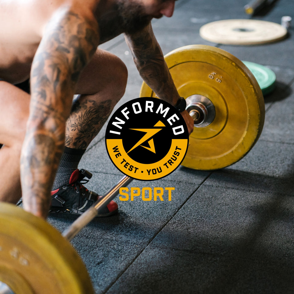 Informed Sport logo overlaid on an image of a weightlifter squatting down to lift a bar bell.